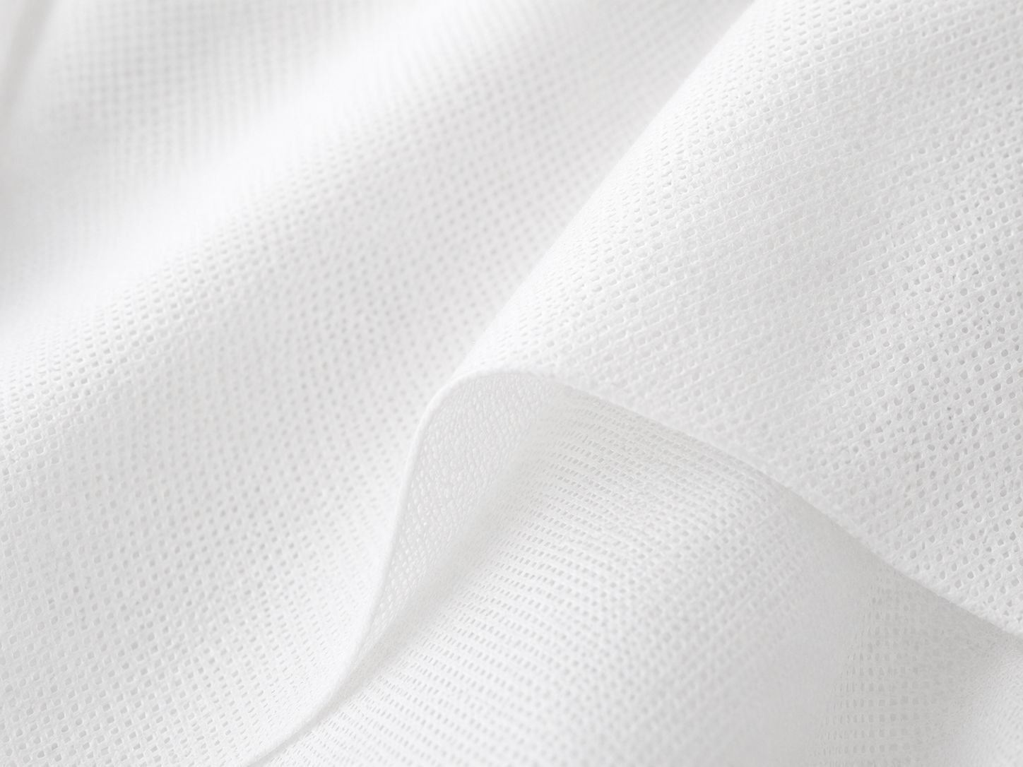 Clean close-up of white non-woven fabric