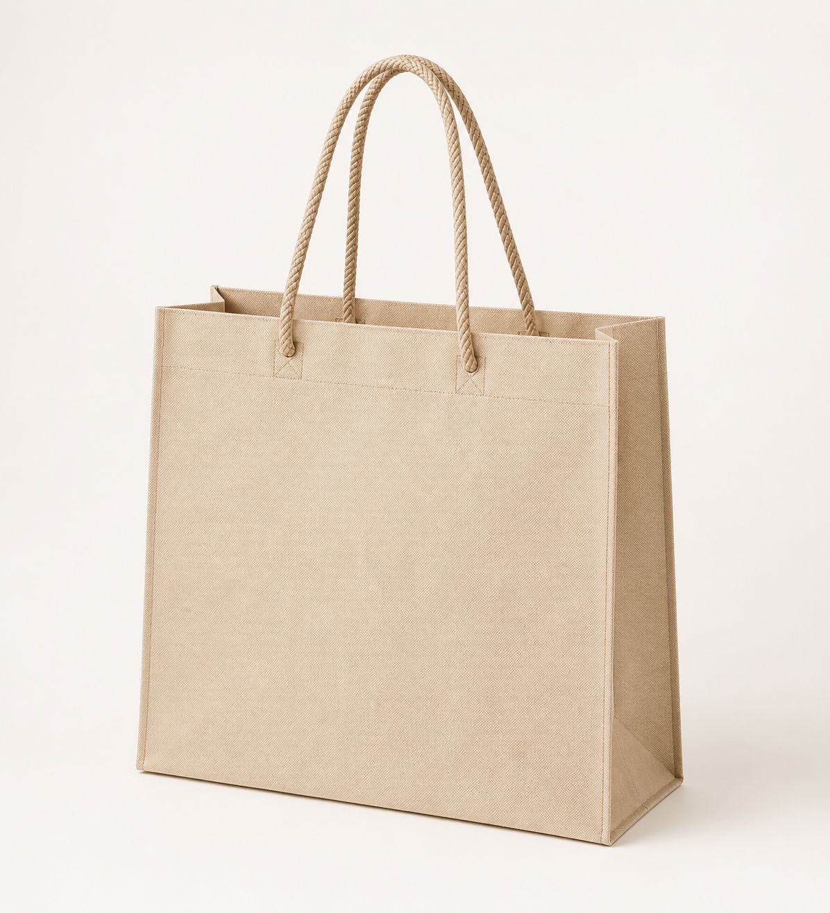 Beige non-woven fabric bag with rope handles on an off-white background