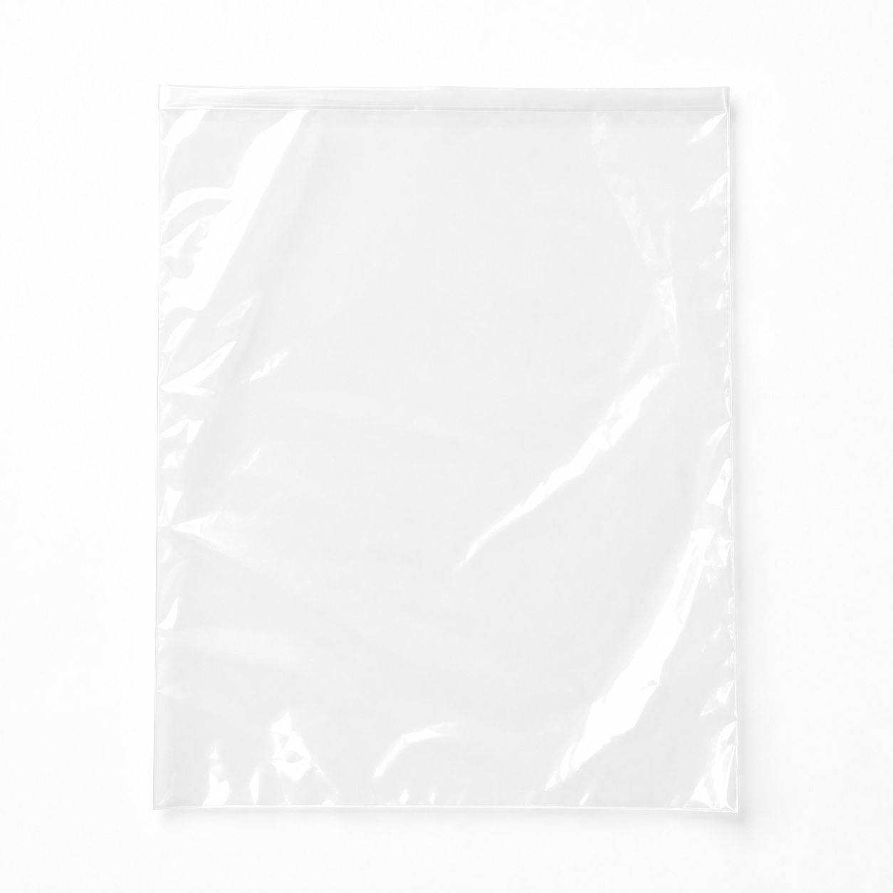 Transparent poly bag arranged neatly on a white background